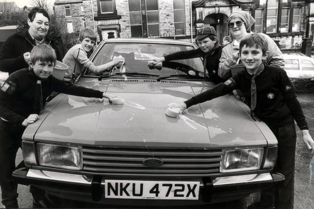 Boys and helpers from the 242nd Walkley Ebenezer Cub Scouts during their car wash service in the car park at Walkley Medical Centre on April. 13 1985. Pictured are David Fowleston, Robert Else, Mark Lilley, Leon Lakin, Gina McLennan and helper Beryl Carney
