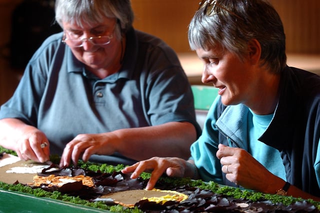 Well dressers, Val Owen and Miranda Forward making panels for Hope well dressing at Loxley Hall, Hope, in 2004