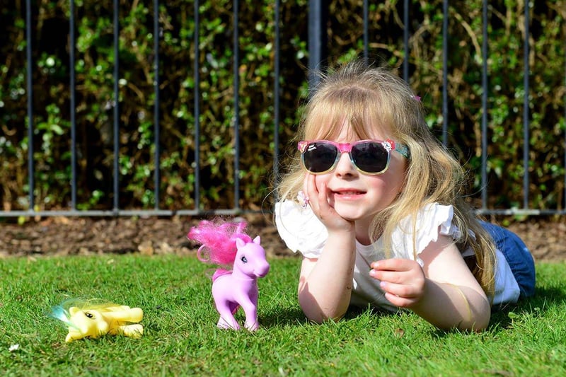 Lilianne Duke Harris playing with her toys at Ward Jackson Park. We love the sunnies Lilianne!