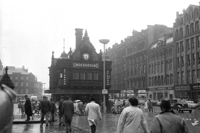 Glaswegian’s hurry to join queue for the subway at St Enoch’s Station. The building is now used as a cafe with there being different entrances to the station in St Enoch Square. 