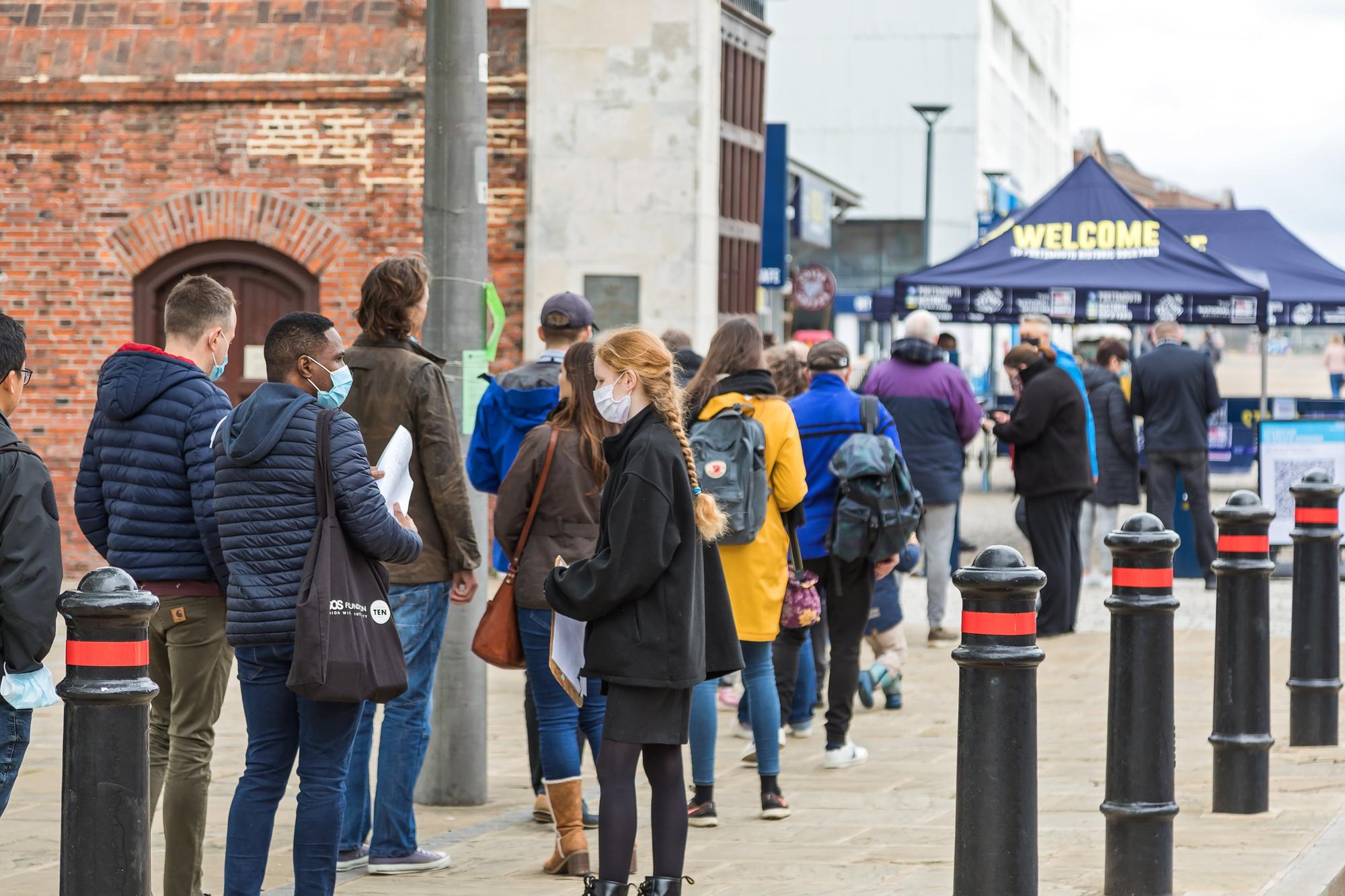 Queues form outside the Historic Dockyard on the first weekend after lockdown. Picture: Mike Cooter (220521)
