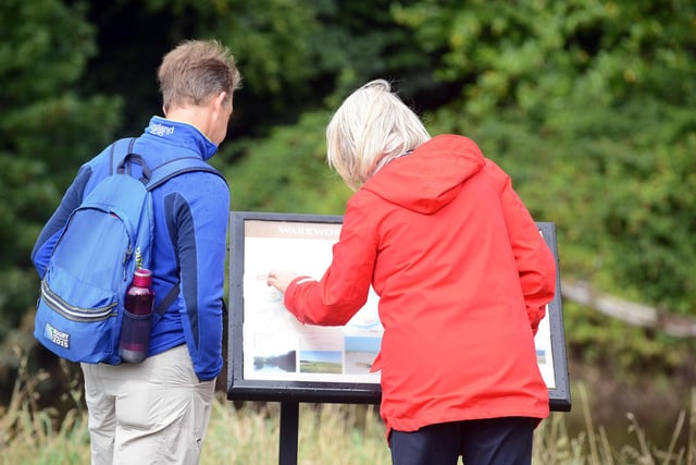 Visitors check out the map at Warkworth.