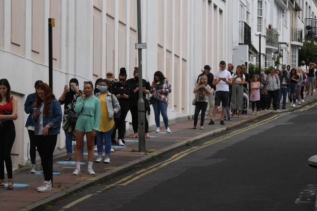 Shoppers queued around the block to enter Primark in Brighton as it reopened its doors.