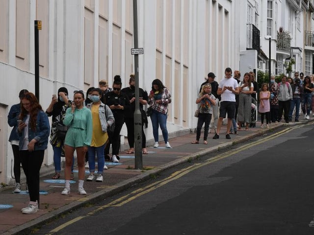 Shoppers queued around the block to enter Primark in Brighton as it reopened its doors.