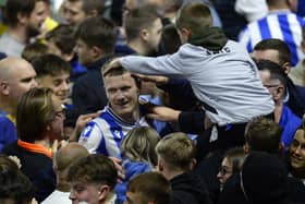 CELEBRATIONS: Michael Smith with Sheffield Wednesday supporters after knocking Peterborough United out of the League One play-off semi-finals in incredible fashion