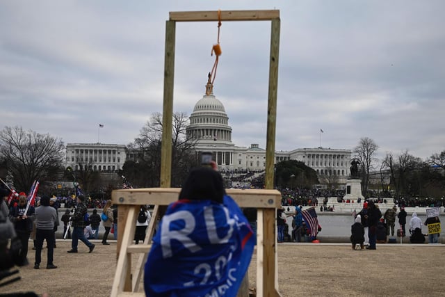 Supporters of US President Donald Trump gather across from the US Capitol on January 6, 2021, in Washington, DC. - Demonstrators breeched security and entered the Capitol as Congress debated the a 2020 presidential election Electoral Vote Certification. (Photo by ANDREW CABALLERO-REYNOLDS / AFP)