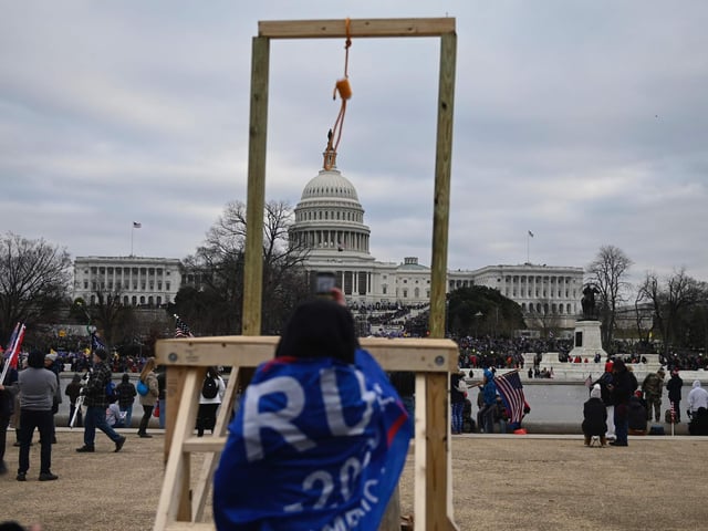 Supporters of US President Donald Trump gather across from the US Capitol on January 6, 2021, in Washington, DC. - Demonstrators breeched security and entered the Capitol as Congress debated the a 2020 presidential election Electoral Vote Certification. (Photo by ANDREW CABALLERO-REYNOLDS / AFP)