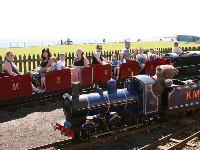 Norrie Sneddon driving a diesel locomotive behind the The West Links Flyer steam train