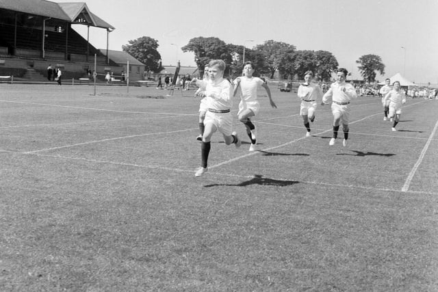 J Nicol wins the 100 yards at the Stewart's College Games at Inverleith in July 1965.