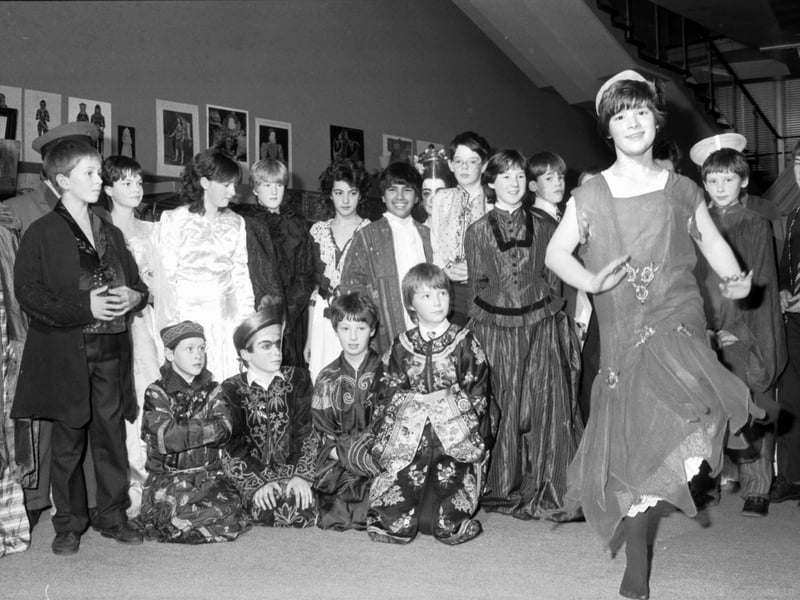 First Year history pupils from George Heriots school in Edinburgh, dressed in vintage clothing from the Royal Museum of Scotland in December 1985. One girl in a 1920s 'flapper' dress dances the Charleston.