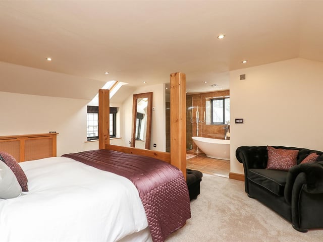 The master suite has a "beautiful" open en-suite and walk-in dressing room.