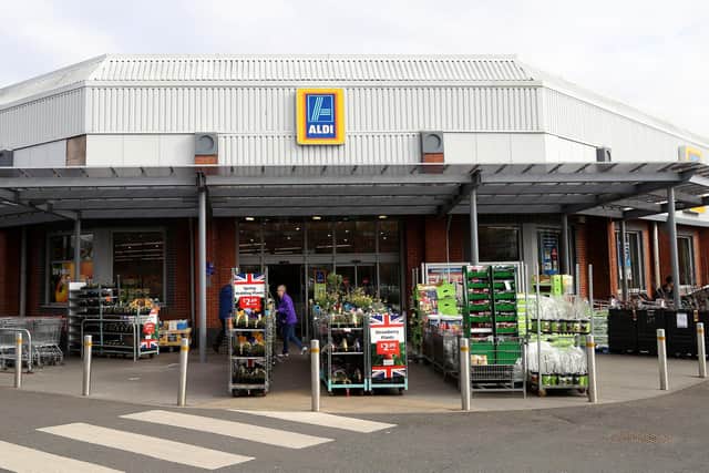 The entrance to an Aldi supermarket   (Photo credit should read GEOFF CADDICK/AFP via Getty Images)