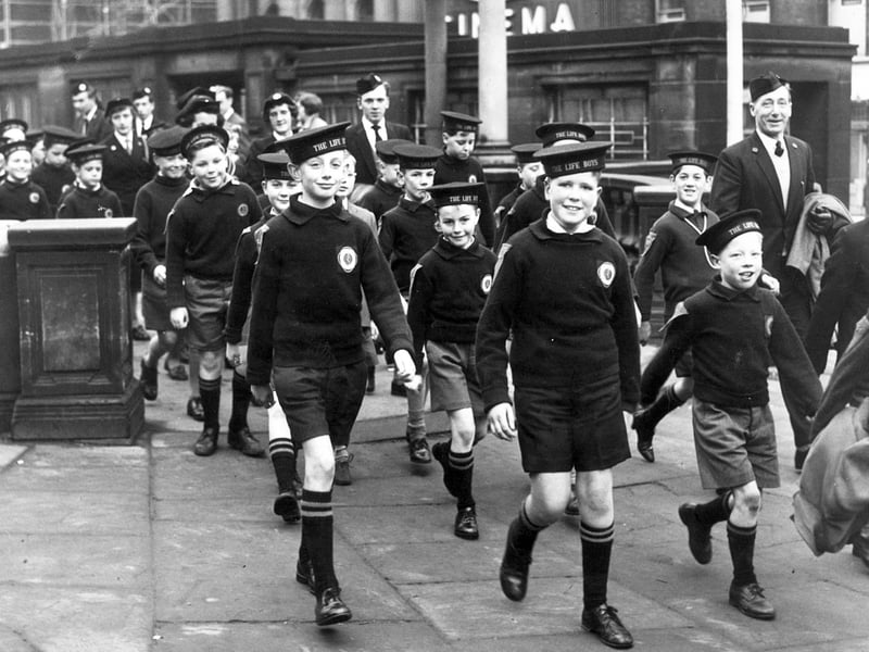 Sheffield area Life Boys make their way through Fitzalan Square for the annual Church Parade at the Victoria Hall, Sheffield, on November 25, 1962