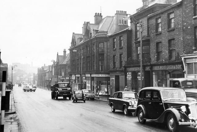 On the right of this picture from January 1961 is James Woodcock & Son and Jameson Antiques