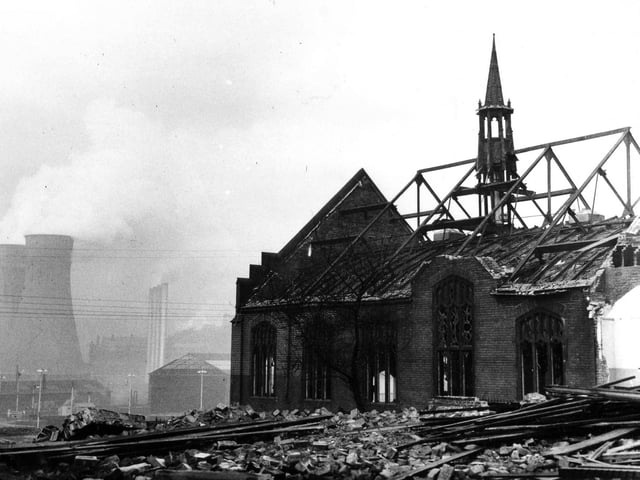 Looking rather lonely is this small tower on top of Tinsley Methodist Church, Sheffield Road, which has been left on by the demolition workers because it cannot be taken down until the roof girders have been removed. In the haze can be seen the Blackburn Meadows Power Station, November 1964