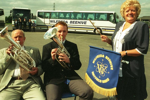 Wilfreda Beehive Garage in  Adwick Le St Doncaster  back in 1998 with Tony Scholey chairman Wilfreda Beehive, musician Peter Jones of the Hatfield Main colliery band who are now sponsored by the bus company, and Sue Scholey chairmans lady