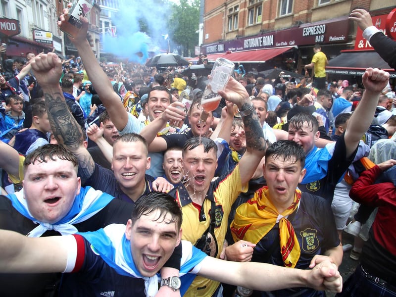 One Scotland fan drenches themselves with a bottle of alcohol ahead of the head-to-head (Photo: Kieran Cleeves/PA Wire).