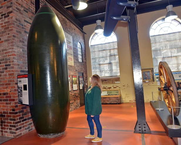 A bomb went off in poland - the big sister version of the bomb seen in kelham island museum with Gemma Holden looking at it.