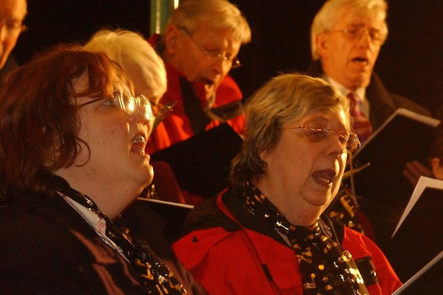 Were you pictured in the choir at the 2006 lantern boat parade?