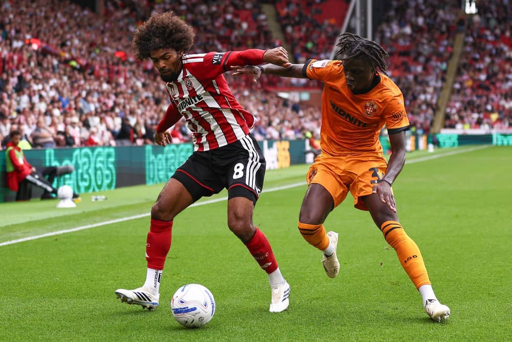 Sheffield, England, 13th September 2026. Hamza Choudhury of Sheffield United battles with Mateus Mane of Wolverhampton Wanderers during the Sheffield United vs Wolverhampton Wanderers Sky Bet Championship match at Bramall Lane, Sheffield. Picture credit should read: Jake Youle / Sportimage