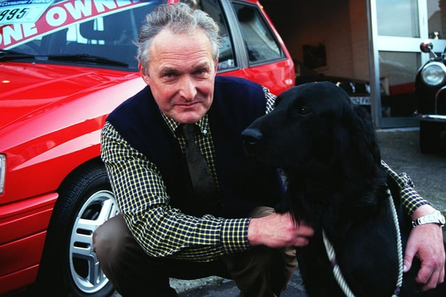 Mr Richard Jennison  owner of Chapel Motors, Cemetery Road, Sheffield with his dog Declan in 1998. Mr Jennison banned the sale of Hynudai cars because Koreans eat dogs.