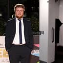 Tim Key's video of him riding the famous paternoster lift at the University of Sheffield's Arts Tower has gone viral on Twitter. Photo: Getty Images/National World