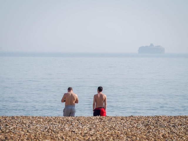 Social distancing on the beach in Southsea near South Parade Pier.