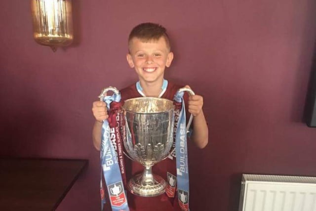 Jak Fada with the FA Vase, which South Shields FC won in May 2017.