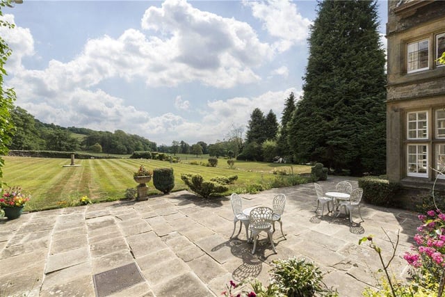 The beautiful formal gardens encompass a terraced area with seating, well manicured grassland and stunning woodland areas.