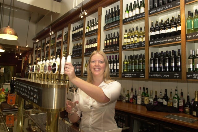 All Bar One's Nina Grootveld pouring a pint in 2004