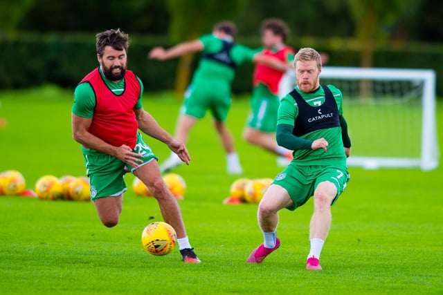 Irish winger Daryl Horgan attempts to get the better of Darren McGregor during a training match