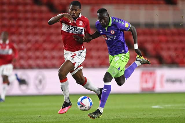 Anfernee Dijksteel of Middlesborough battles for possession with Famara Diedhiou of Bristol City.
