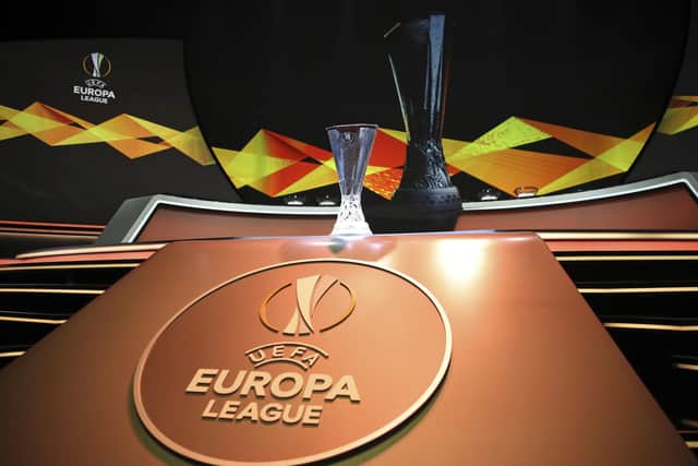 The Europa League trophy is put on display before the UEFA Europa League group stage draw at the Grimaldi Forum, in Monaco, Friday, Aug. 30, 2019. (AP Photo/Daniel Cole)