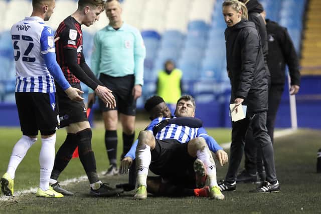 Hartlepool United's Mike Fondop-Talom appeared to have Sheffield Wednesday's Callum Paterson in a headlock. (Credit: Will Matthews | MI News)