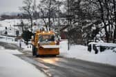 A snowplough clears the road  (Photo by Jeff J Mitchell/Getty Images)