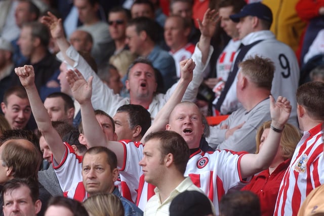 Blades fans in full voice at the City Ground during their side's play-off semi-final first leg game with Nottingham Forest in May 2003.