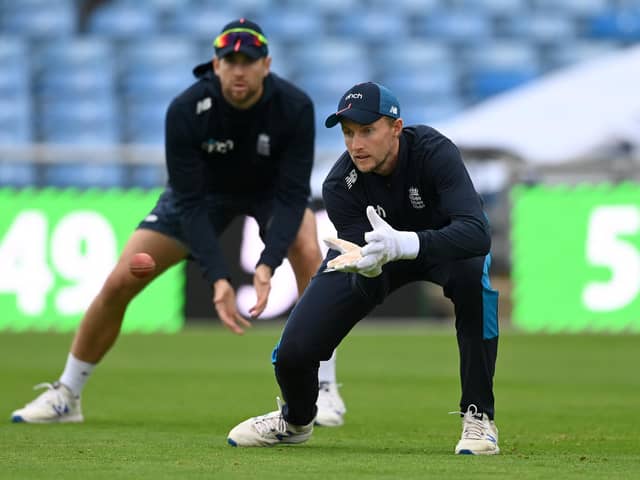 England captain Joe Root catches watched by Dawid Malan during a nets session at Emerald Headingley Stadium on Tuesday.