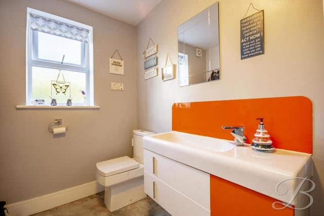The family bathroom boasts a roll-top, claw-foot bath. It also includes a vanity wash hand basin, a towel radiator, two Velux windows to the back of the property and laminate flooring.