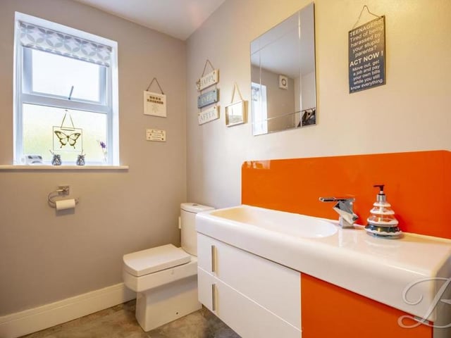 The family bathroom boasts a roll-top, claw-foot bath. It also includes a vanity wash hand basin, a towel radiator, two Velux windows to the back of the property and laminate flooring.