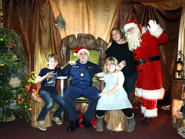 Chris Tisdell was reunited with his wife Helen and children, Loisand Ewan at Santa's Grotto at Marwell Zoo