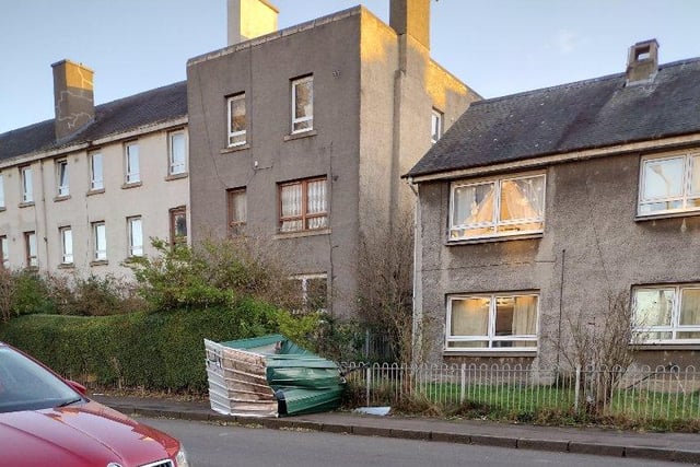 In North Edinburgh on Friday night,  someone's metal shed had flown over a block of flats to the main pavement.