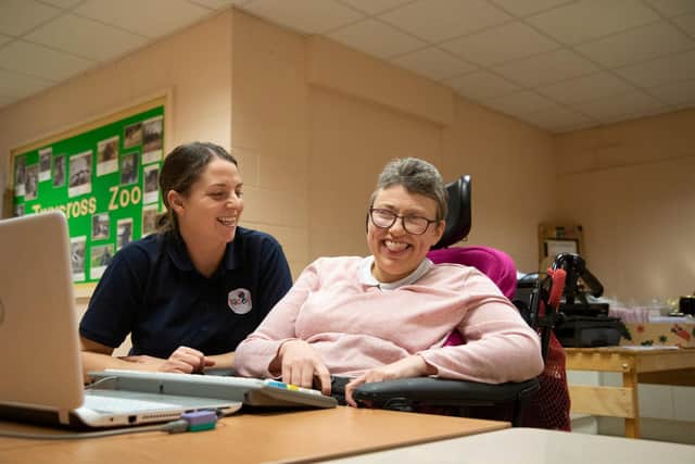 Adult Support Worker Emma with one of the adults she supports at Paces in Sheffield.