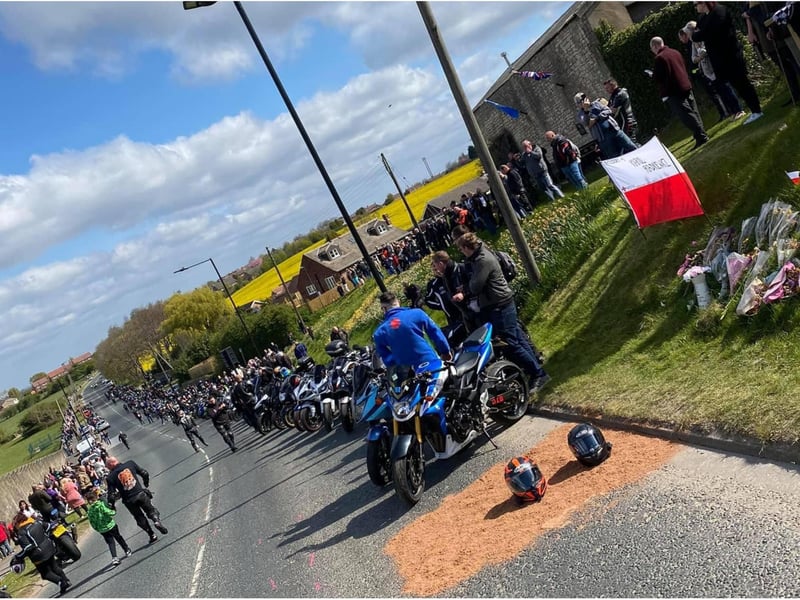 Motorcycle helmets were among tributes left.