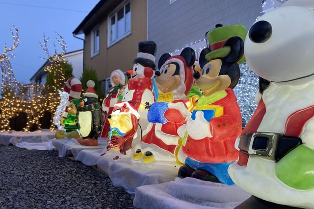 Disney characters feature in the Christmas light display outside of Jack Richardson's home.