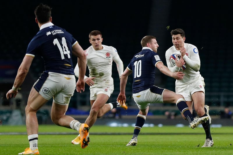 Scotland's fly-half Finn Russell trips England's scrum-half Ben Youngs and is yellow carded during the Six Nations rugby union match between England and Scotland at Twickenham Stadium