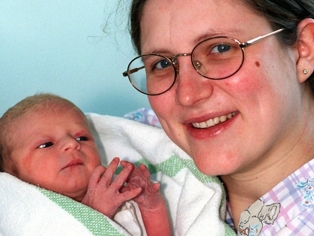Pictured at Northern General Hospital is Clair Pickin from Thorpe Hesley with Kiera born at 05.55am on New Year's Day 2000 weighing 6lbs 6ozs