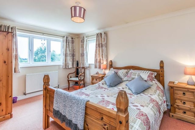 The master bedroom is bright and oozing comfort, with double-glazed windows, a central heating radiator and coving to the ceiling. Its en suite is fitted with a shower, wash hand basin and low-level WC.