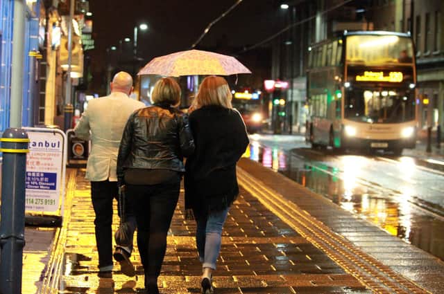 People enjoying Sheffield's nightlife on West Street.