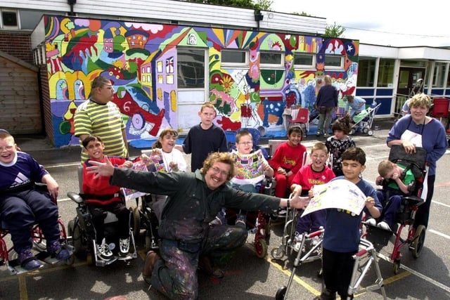 Youngsters from Oak Park School, Sheffield, working on a giant mural for the Children’s Festival in 2000.