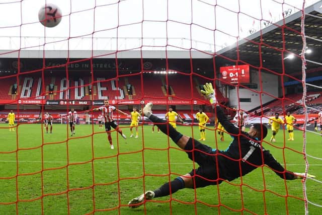 Billy Sharp equalises from the spot against Fulham. Photo by GARETH COPLEY/POOL/AFP via Getty Images
